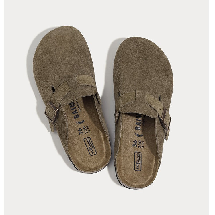 A pair of Birkenstock Bungee clogs in taupe brown suede, shown from a top-down view on a light gray background.